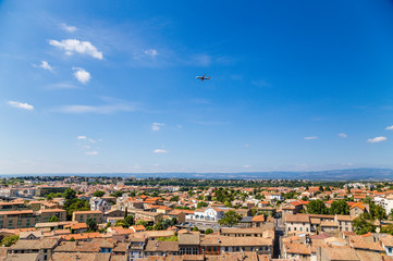 Fototapeta na wymiar Carcassonne, France. Airplane above the lower town