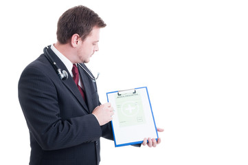 Medic or doctor showing medical prescription on clipboard