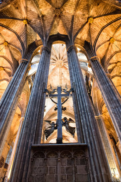 Cross and Pillars In Historic Barcelona Cathedral
