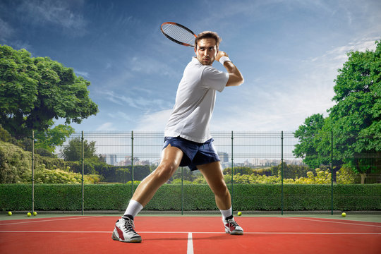 Young Man Is Playing Tennis