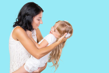 Happy mother and child girl