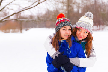 Two Winter women have fun outdoors