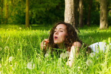 Woman having rest on meadow