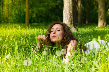 Woman having rest on meadow