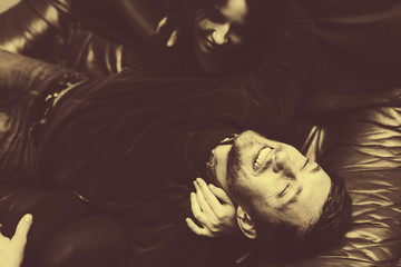 Vintage couple hugs and laughing