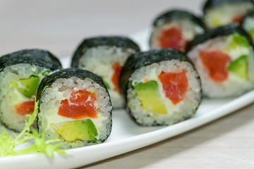 Close-up  Maki sushi arranged on plate, shallow depth of field,