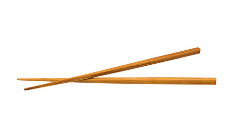 Wooden pairs of chopsticks on white background