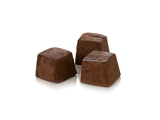 Chocolate pieces on white background