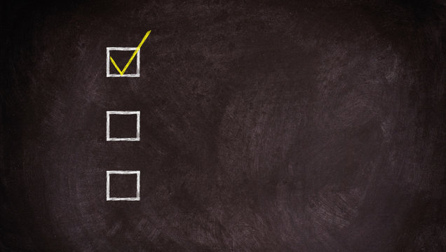 Checklist at the blackboard with copy space