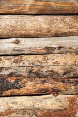 Old rough wooden planks with cracks as background