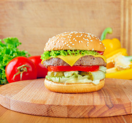 Fresh tasty cheeseburger
