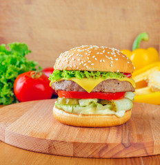Fresh tasty cheeseburger