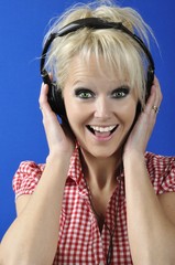 Blond woman listening to music