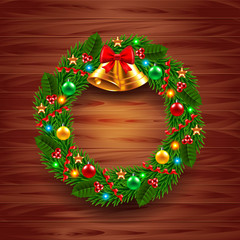 Christmas wreath on wooden background