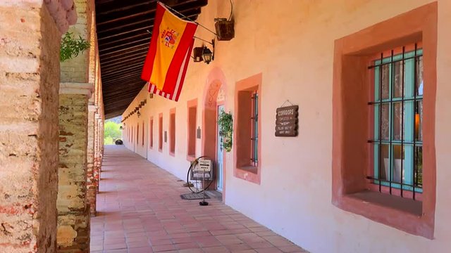 View of the columns and adobe walls of a California Mission.