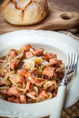 Stewed onions with sausage.