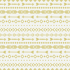 Hand drawn gold geometric ethnic seamless pattern. Wrapping