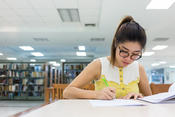 study education, woman writing a paper, working women