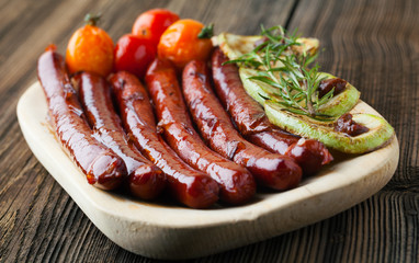 Grilled sausages with vegetables