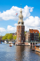 The Montelbaanstoren on the Oudeschans canal in Amsterdam, the Netherlands.