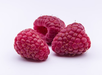 Raspberries isolated on white background