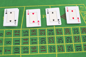 Deck of cards on green carpet
