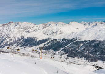 Fototapeta na wymiar View of skiing resort in Alps. Livigno, Italy