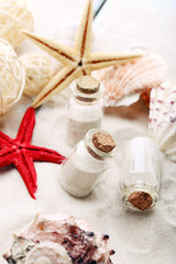 Beautiful seashells on sand background