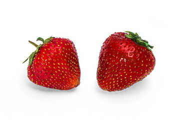 Two strawberries isolated on white background