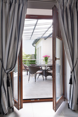 Balcony door with curtains