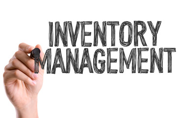 Hand with marker writing: Inventory Management