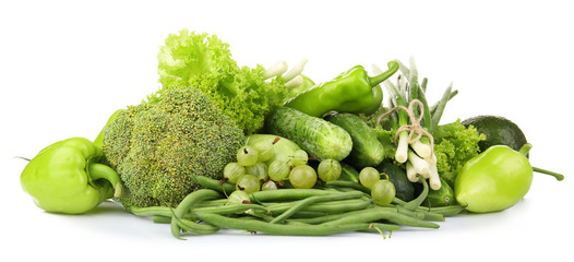 Heap of green vegetables isolated on white