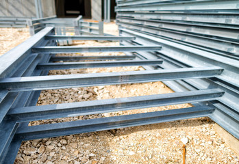 Steel girders in outdoor warehouse