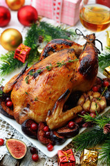Roasted chicken with figs, cranberries and garlic for Christmas