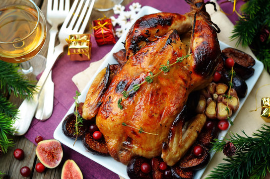 Roasted chicken with figs, cranberries and garlic for Christmas