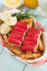 Crab sticks skewer and french fries