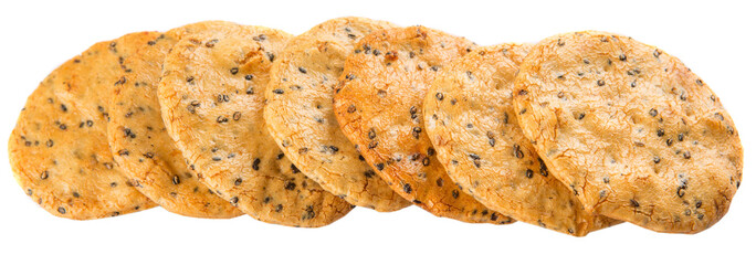 Japanese rice crackers, locally known as senbei over white background