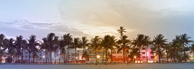 Fotobehang Miami Beach Florida, hotels and restaurants on Ocean Drive, world famous travel destination. Desaturated instagram filter processing for vintage looks © FotoMak