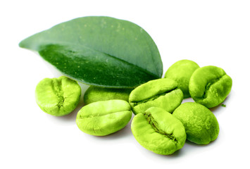 Green coffee beans with leaf isolated on white