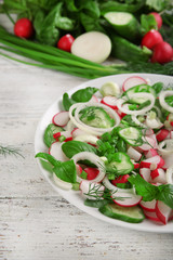 Fresh vegetable salad on table close up