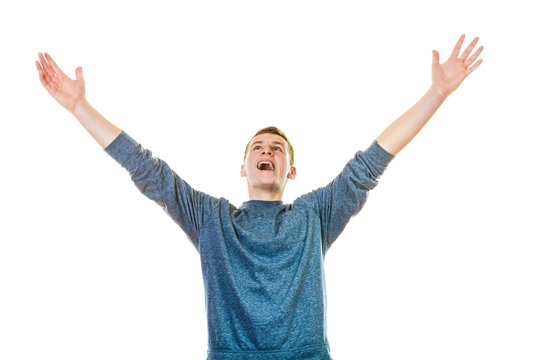 Happy man successful lad with arms up