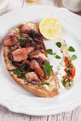 Grilled squid on toasted bread