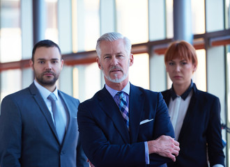 Fototapeta premium senior business man with his team at office