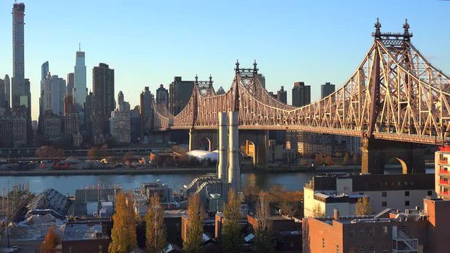 Beautiful shot of Manhattan New York skyline with Queensboro Bridge and Queens foreground.