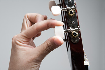 Fototapeta premium tuning guitar