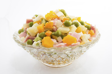 Russian salad in a glass bowl