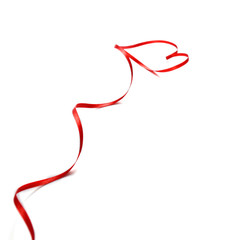 Red heart ribbon isolated on white