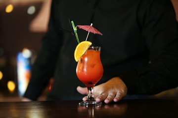 Bartender making cocktail