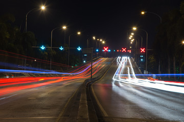 Fototapeta na wymiar traffic light trails in modern city at night