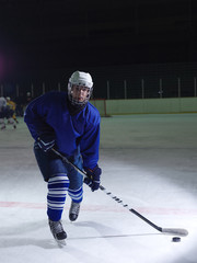 Naklejka premium ice hockey player in action